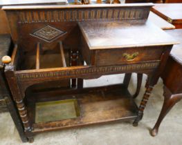 A late Victorian carved oak hallstand