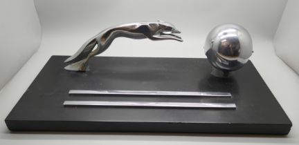 A mid 20th Century Art Deco black and chrome pen stand with globular inkwell, lacking inkwell