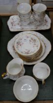 A Paragon Victoriana Rose six setting tea set with sandwich plate, lacking one cup **PLEASE NOTE