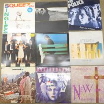 A collection of 1980s LP records including Squeeze, Simple Minds, Blondie, Boz Skaggs, Ultravox,