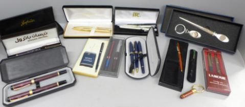 A collection of pen sets