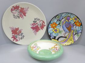 A Crown Ducal charger, a Crown Devon bowl and a plate decorated with a bird and flowers