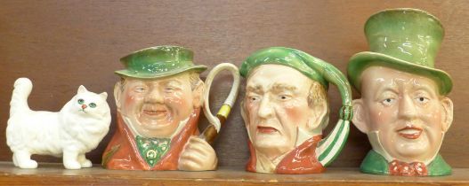 Three Beswick Charles Dickens character jugs, and a Beswick cat