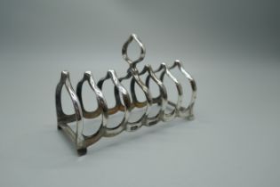 A silver toast rack, Birmingham 1927, 57g