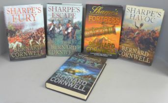 Five hardback first edition novels by Bernard Cornwell from the Sharpe series; Sharpe's Fortress