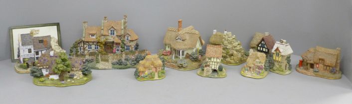A collection of model cottages, mainly Lilliput Lane including The Trip to Jerusalem, Nottingham,