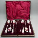 A cased set of plated spoons