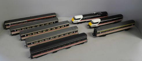 OO gauge model rail, six coaches, a dummy car and a motor car