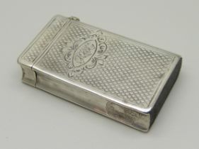 A continental silver vesta case in the form of a book, with control marks, (tests as silver)