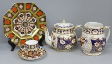 A Royal Crown Derby octagonal 1128 Imari plate, second, a Crown Derby cup and saucer and an Imari