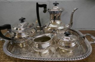 A four piece silver platd tea service and two handled gallery tray