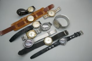 A collection of gentleman's wristwatches including Services, Timex, Bulova and Roamer