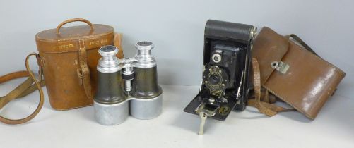 A pair of Negretti & Zambra field glasses in a leather case and a Eastman Kodak No2 Folding