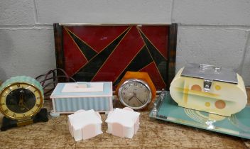 Art Deco items, two drinks trays, biscuit barrel, two clocks, one in phenolic butterscotch and three