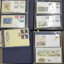 Four albums of vintage First Day Covers stamps including racing cars, boats, trains, Royalty, etc.