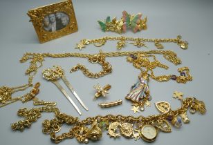 A collection of Kirks Folly USA designer necklaces, picture frame, hair slides, brooches, charm