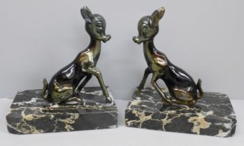 A pair of Art Deco 'Bambi' figures/bookends on marble bases