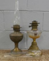 Two oil lamps **PLEASE NOTE THIS LOT IS NOT ELIGIBLE FOR POSTING AND PACKING**