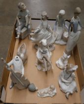 A collection of Nao and other Spanish figures, nine in toal, some a/f and a small Lladro figure of a