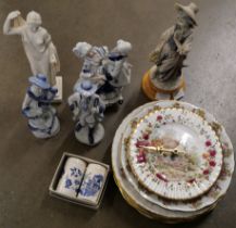 A Guiseppe Armani figurine, a Capodimonte figure, girl with flower basket, Spode salt and pepper