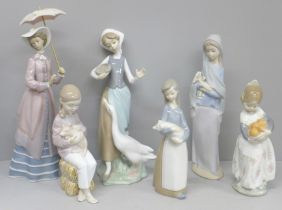 Six Lladro figures, matt finish figure with chip to petals of flowers