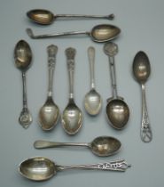 Ten silver golfing spoons, 134g