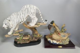 Two resin figure groups; a model of a Siberian tiger and mallard ducks