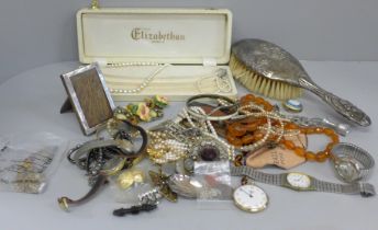 Costume jewellery, watches, a small silver photograph frame and a silver Reynolds Angels brush