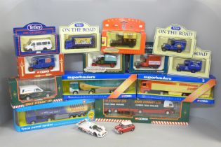 A collection of Corgi Toys and other die-cast model vehicles, boxed, including two Superhaulers