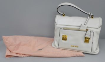 A Miu Miu leather bag in white, by Prada