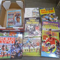 A box of Football books including a 1991 FA Cup Final programme and a World Cup 90 sticker album/