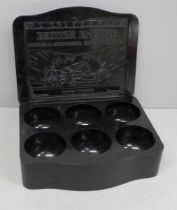 A British Engine Insurance Bakelite box with six compartments