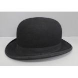 A Moores bowler hat, The Tween Hat, 7 1/8 & 1/16
