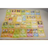 50 Base Set vintage Pokemon cards, common/uncommon and rare