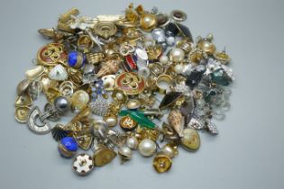 Over sixty pairs of costume earrings