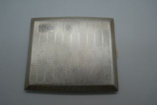 An Art Deco silver cigarette case, Birmingham 1927, 159g