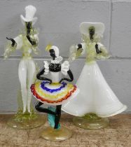 A pair of 1950s Murano glass figures of Calypso dancers, 43cm tallest and one similar smaller figure