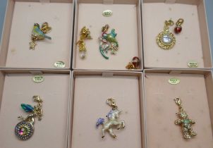 A collection of Kirks Folly USA designer charms