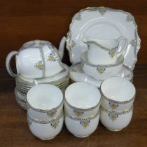 A Paragon Bristol Art Deco tea set, one cup with hairline crack and one cup restored **PLEASE NOTE