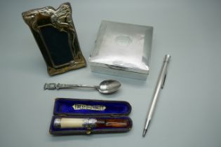 Silver items; a cigarette box, Eversharp pencil, a photograph frame, continental spoon and a cheroot