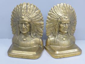 A pair of brass Native American bookends