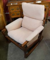 A Danish teak rocking chair