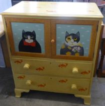 A painted child's nursery cupboard