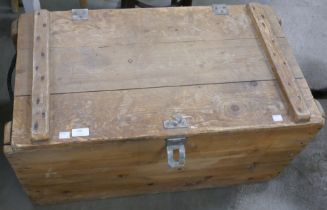 A pine box and two crates