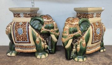 A pair of Oriental elephant shaped porcelain garden seats