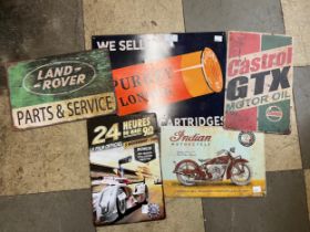 Five metal advertising signs