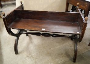 A 19th Century French faux rosewood double sided book table