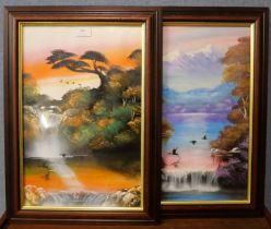 A pair of exotic river landscape prints, framed