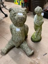 Two concrete garden ornaments; Teddy bear and a lady