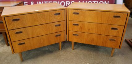 A pair of Danish teak chests of drawers